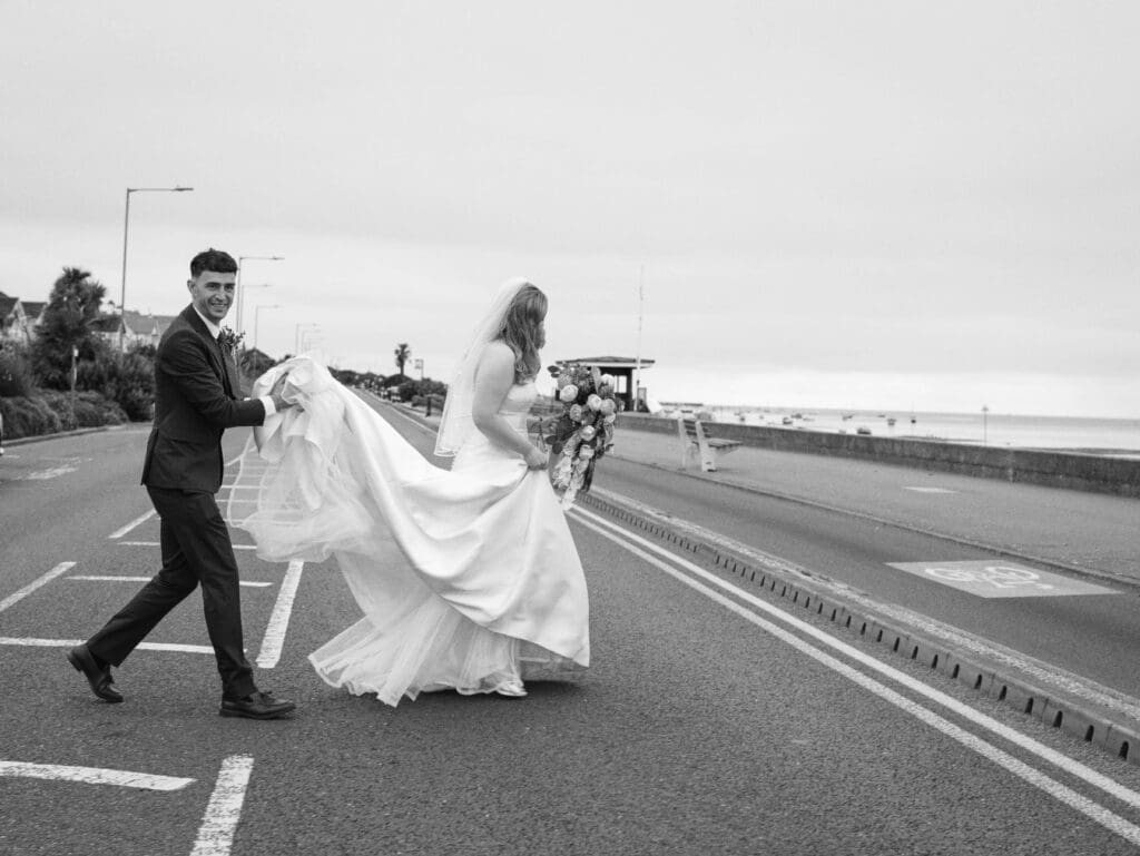 Bride and groom portraits outside the Roslin Hotel in Southend during their seaside wedding.