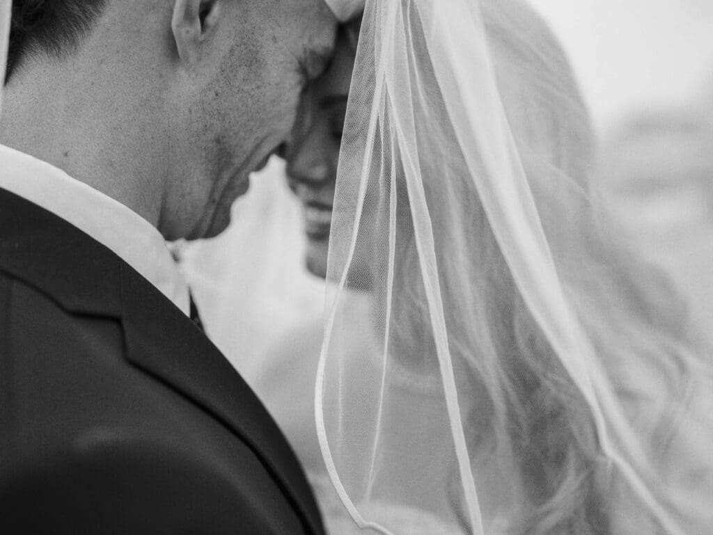 Bride and groom portraits outside the Roslin Hotel in Southend during their seaside wedding.